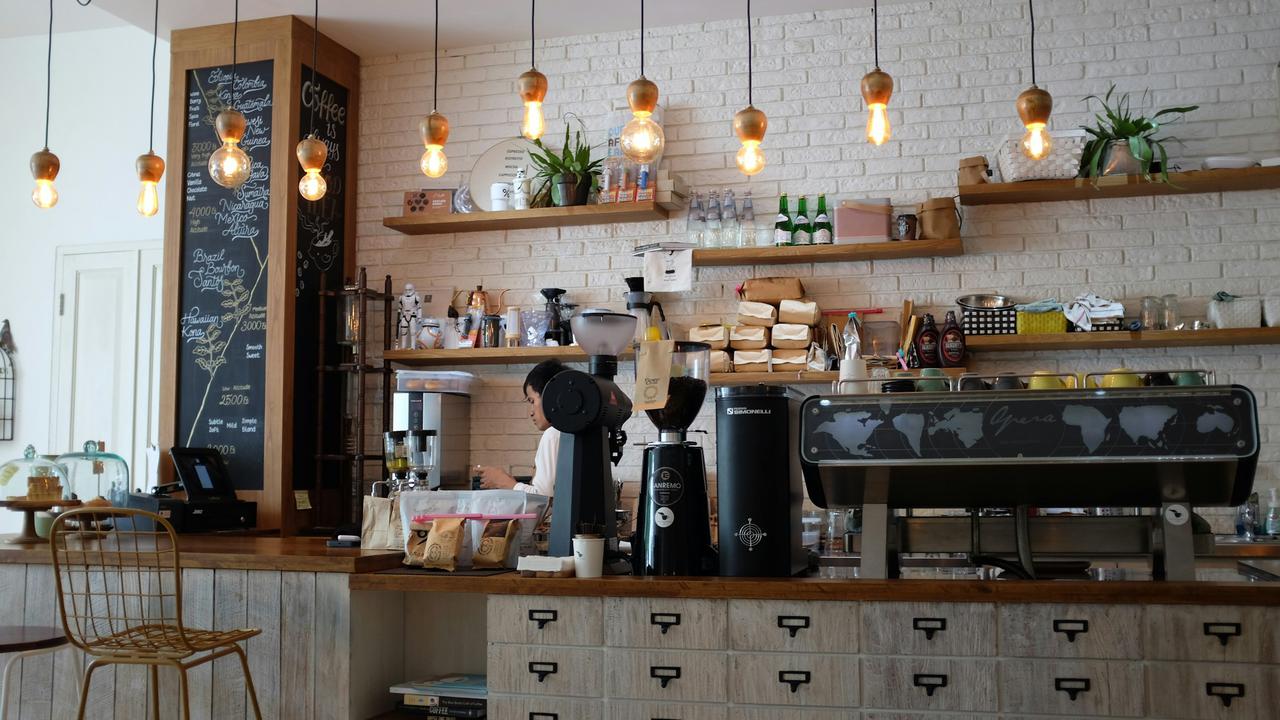 Coffee equipment and small appliances at a café counter